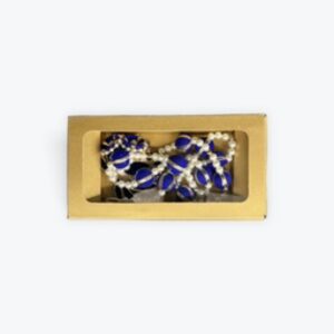 Blue lotus with gota ball hanging